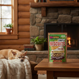 Package of K9 Granola Factory Simply Biscuits dog treats on a table next to a chihuahua